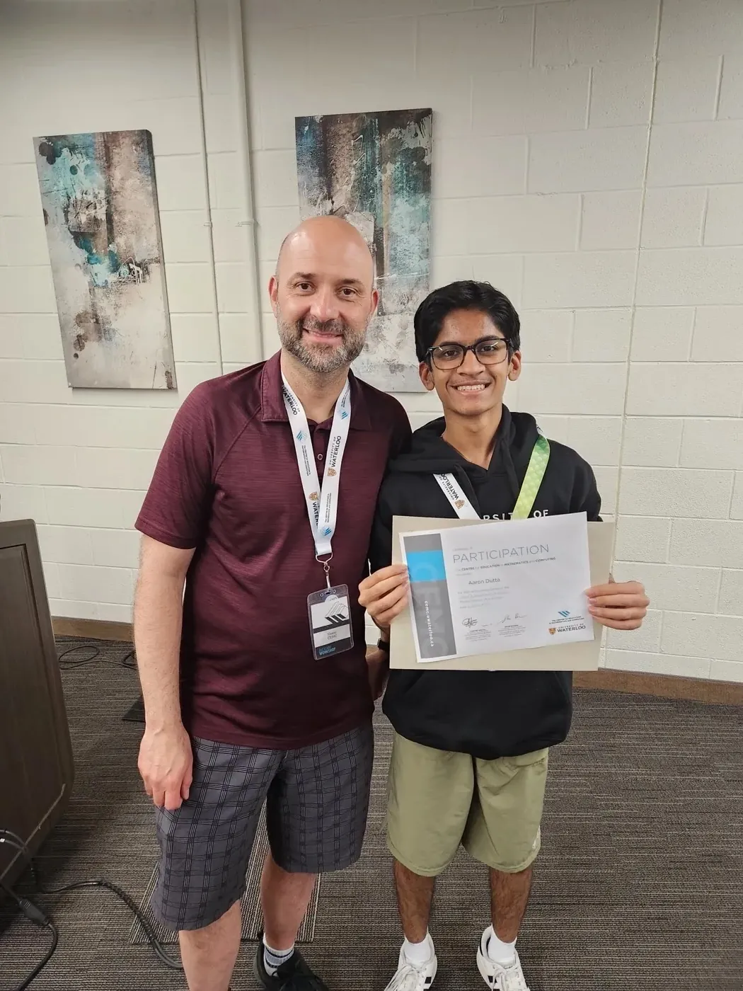 Aaron with certificate